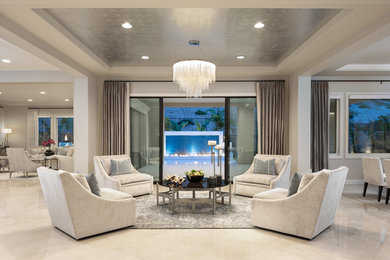 Transitional formal and open concept marble floor and beige floor living room photo in Orange County with gray walls