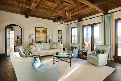 Tuscan formal and enclosed dark wood floor and brown floor living room photo in Other with beige walls