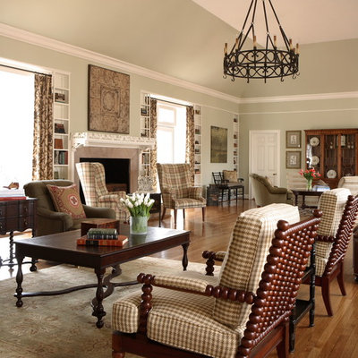 Example of a classic living room design in Atlanta with green walls