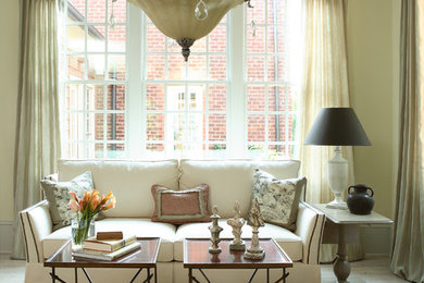 Inspiration for a timeless living room remodel in Atlanta with beige walls
