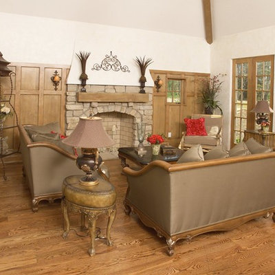 Inspiration for a transitional living room remodel in Cleveland with a standard fireplace