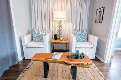 Medium sized coastal formal enclosed living room in Jacksonville with grey walls, dark hardwood flooring, no fireplace and no tv.
