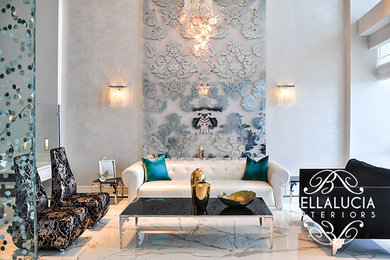 Example of an eclectic formal and open concept marble floor living room design in Miami with gray walls and no tv