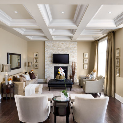 Inspiration for a timeless enclosed brown floor living room remodel in Toronto with a stone fireplace, a standard fireplace and a wall-mounted tv