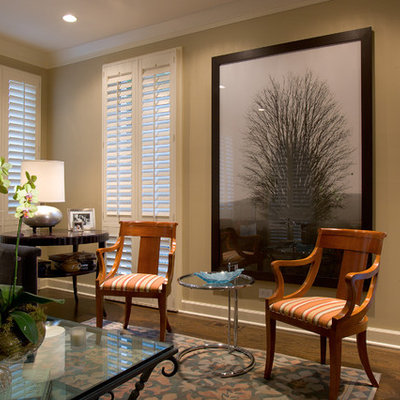 Eclectic living room photo in Chicago with beige walls