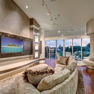 Huge minimalist living room photo in Miami with a wall-mounted tv