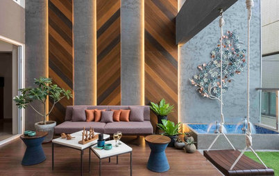 This is How Designers Decorate Double-Height Living Rooms