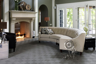 Inspiration for a large contemporary formal and enclosed carpeted and gray floor living room remodel in Boston with gray walls, a standard fireplace and a plaster fireplace