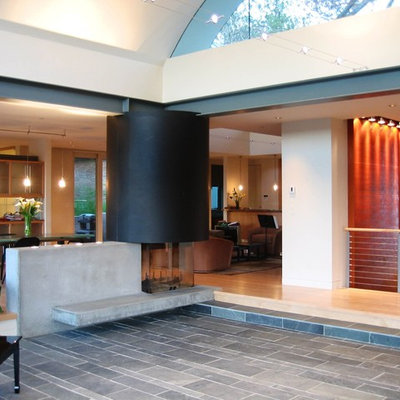 Large trendy formal and open concept slate floor living room photo in San Francisco with beige walls, no fireplace and no tv