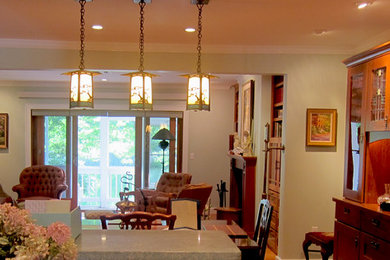 Elegant living room photo in Portland Maine with beige walls