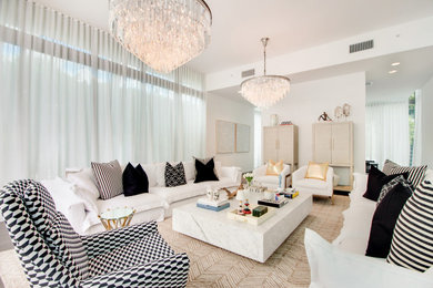 Trendy formal and enclosed living room photo in Miami with white walls, no fireplace and no tv