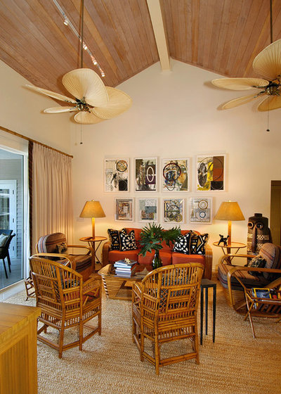 Tropical Living Room by GIL WALSH INTERIORS