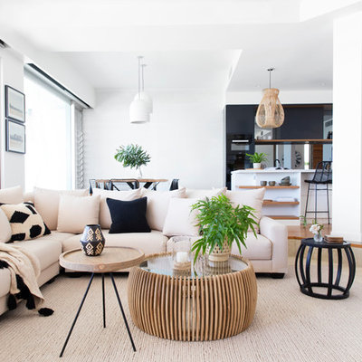 Large trendy open concept light wood floor and beige floor living room photo in Gold Coast - Tweed with white walls, a two-sided fireplace, a tile fireplace and a wall-mounted tv