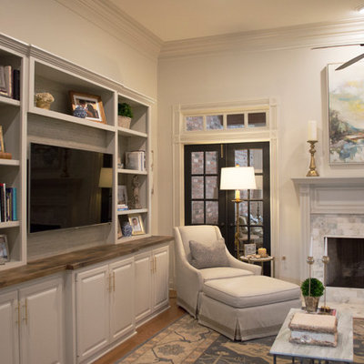 Inspiration for a mid-sized transitional formal and open concept dark wood floor living room remodel in New Orleans with white walls, a standard fireplace, a tile fireplace and a media wall