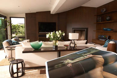 Photo of a large contemporary formal open plan living room in Orange County with brown walls, limestone flooring, a standard fireplace, a metal fireplace surround, a built-in media unit and grey floors.