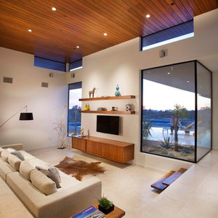 Photo of a contemporary formal living room in San Diego with white walls, no fireplace and a wall mounted tv.
