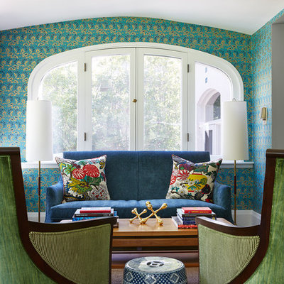 Example of a mid-sized eclectic formal and enclosed dark wood floor and brown floor living room design in Minneapolis with blue walls, no fireplace and no tv