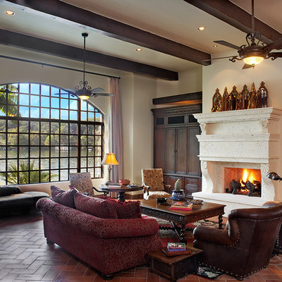 Huge mountain style living room photo in Austin with a standard fireplace