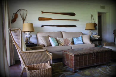 Example of an island style living room design in Dallas