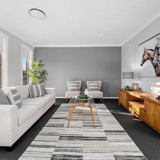 Photo of a contemporary living room in Sydney with grey walls, carpet and grey floor.