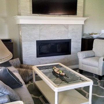 Large tile fireplace with mantel