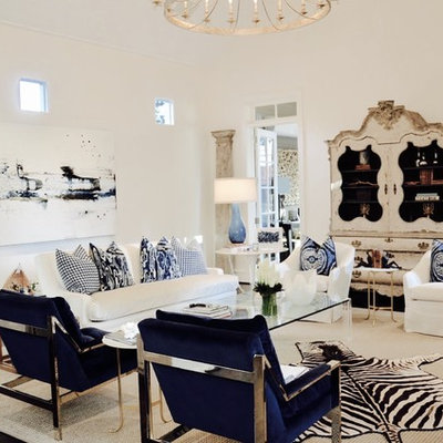 Inspiration for a transitional formal and enclosed dark wood floor living room remodel in Houston with white walls