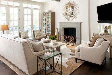 Living room - mid-sized contemporary open concept dark wood floor and brown floor living room idea in San Luis Obispo with white walls, a standard fireplace, a concrete fireplace and a wall-mounted tv