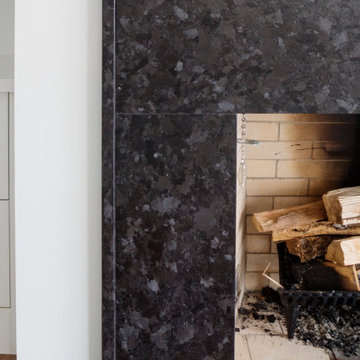 Leathered Antique Brown Granite Fireplace