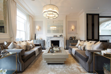 Inspiration for a traditional living room in London with white walls, dark hardwood flooring and brown floors.