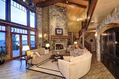 Huge transitional open concept and formal limestone floor and brown floor living room photo in Raleigh with beige walls, a standard fireplace, a stone fireplace and a media wall