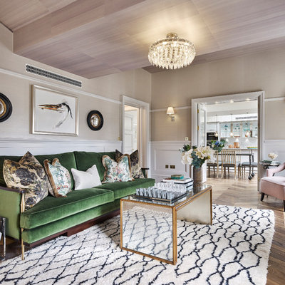 Mid-sized transitional formal and enclosed medium tone wood floor and brown floor living room photo in London with beige walls, no fireplace and a concealed tv