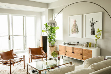 Mid-sized trendy light wood floor living room photo in San Francisco with gray walls