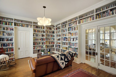 Living room library - victorian living room library idea in Chicago
