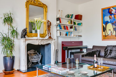 This is an example of a large eclectic living room in London.