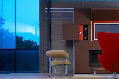 This is an example of a modern living room in London with a built-in media unit.