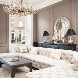 Inspiration for a beach style living room in Other with grey walls.