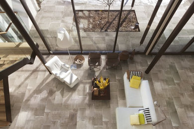 Inspiration for a modern loft-style porcelain tile living room remodel in Chicago