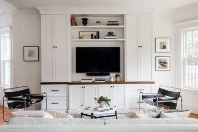 Example of a transitional living room design in Boston