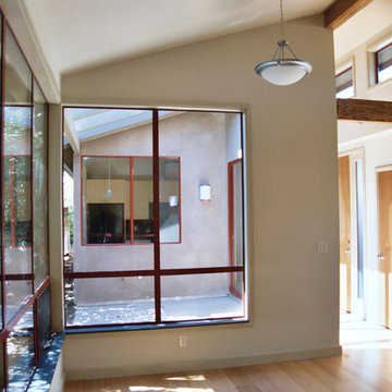 Living Room & Patio, Faculty House, Palo Alto, CA, ENRarchitects with Topos Arch