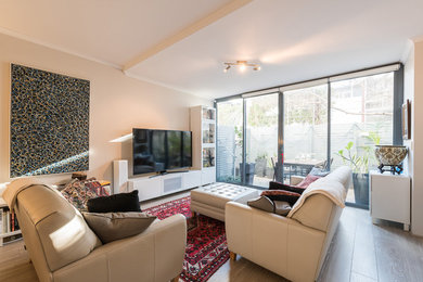Photo of a living room in Gold Coast - Tweed.