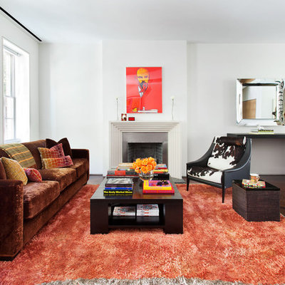 Living room - contemporary enclosed dark wood floor living room idea in New York with white walls, a standard fireplace and no tv