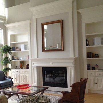 Living room bookcase with built in fireplace