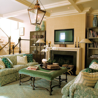 Living room - traditional living room idea in Chicago with a standard fireplace and a wall-mounted tv