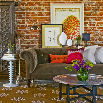 Living room - eclectic living room idea in Kansas City with red walls
