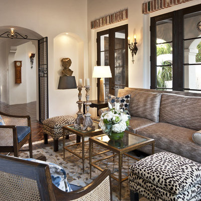 Living room - mid-sized mediterranean formal and enclosed ceramic tile and brown floor living room idea in Los Angeles with white walls, no fireplace and no tv