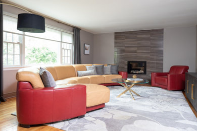 Mid-century modern living room photo in New York