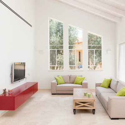 Example of a trendy formal and open concept living room design in Other with white walls and a wall-mounted tv