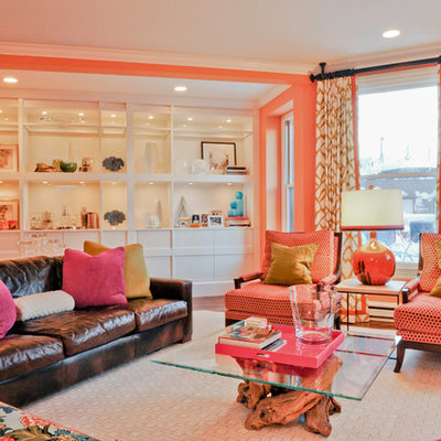 Eclectic living room photo in Boston with orange walls