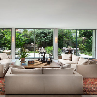 Inspiration for a huge contemporary living room remodel in Other with white walls