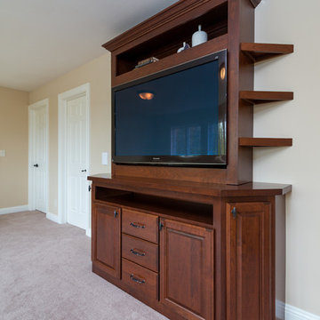 Living Room Entertainment Center in Cherry with Raised Panel Doors